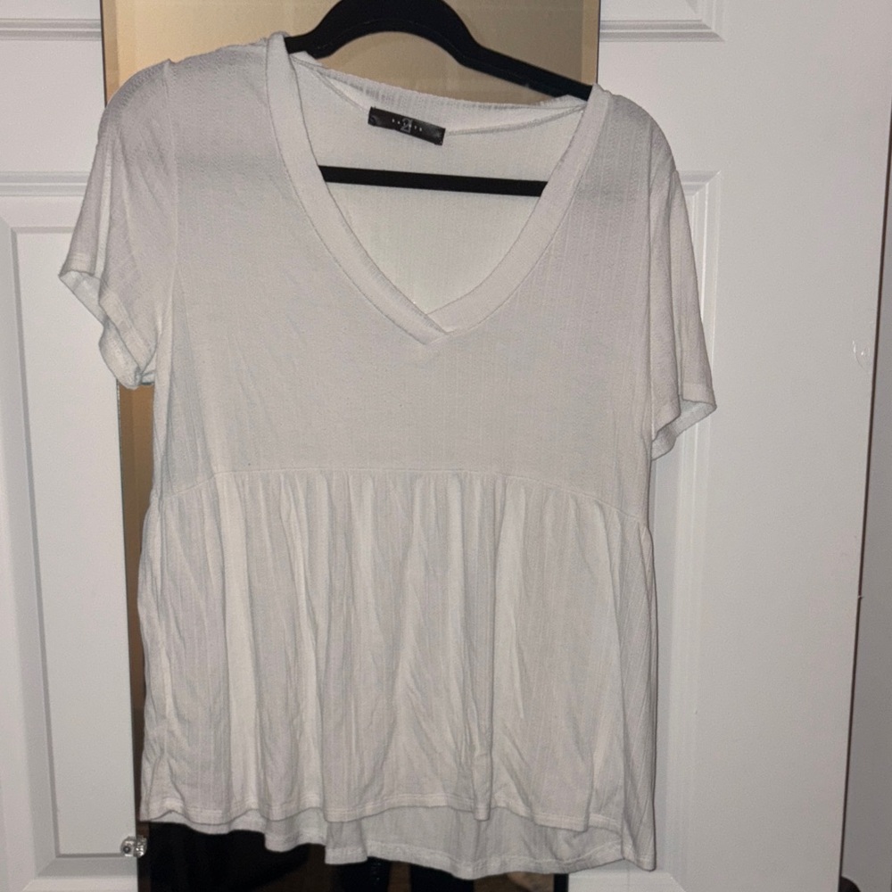 Elegant White V-Neck Peplum Top